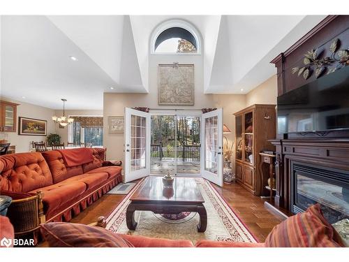 7 Sherwood Crescent, Tiny, ON - Indoor Photo Showing Living Room With Fireplace