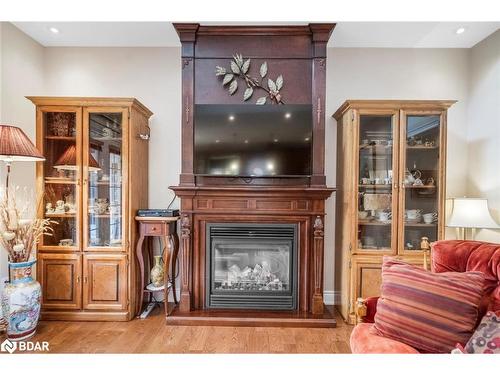 7 Sherwood Crescent, Tiny, ON - Indoor Photo Showing Living Room With Fireplace