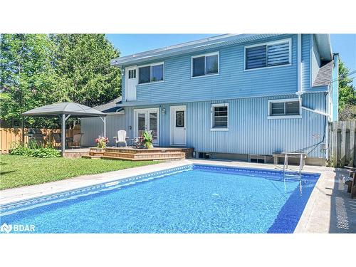 326 Crawford Street, Orillia, ON - Outdoor With In Ground Pool With Deck Patio Veranda With Backyard