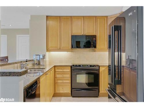 1210-6 Toronto Street, Barrie, ON - Indoor Photo Showing Kitchen With Double Sink