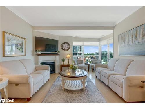 1210-6 Toronto Street, Barrie, ON - Indoor Photo Showing Living Room With Fireplace