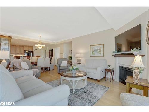 1210-6 Toronto Street, Barrie, ON - Indoor Photo Showing Living Room With Fireplace