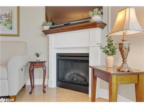 1210-6 Toronto Street, Barrie, ON - Indoor With Fireplace