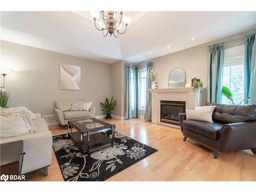 107 Cumming Drive, Barrie, ON - Indoor Photo Showing Living Room With Fireplace