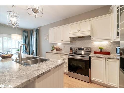 107 Cumming Drive, Barrie, ON - Indoor Photo Showing Kitchen With Double Sink With Upgraded Kitchen