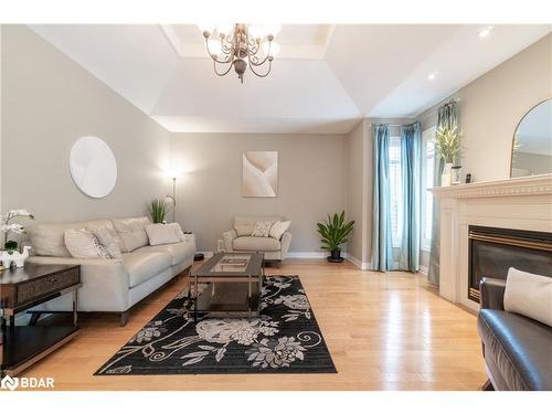 107 Cumming Drive, Barrie, ON - Indoor Photo Showing Living Room With Fireplace