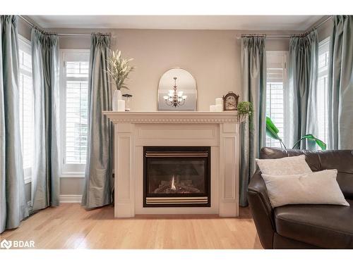 107 Cumming Drive, Barrie, ON - Indoor Photo Showing Living Room With Fireplace