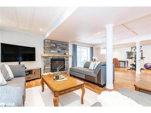 35 Princess Point Drive, Wasaga Beach, ON - Indoor Photo Showing Living Room With Fireplace