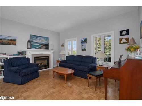 9-90 Thompsons Road, Penetanguishene, ON - Indoor Photo Showing Living Room With Fireplace