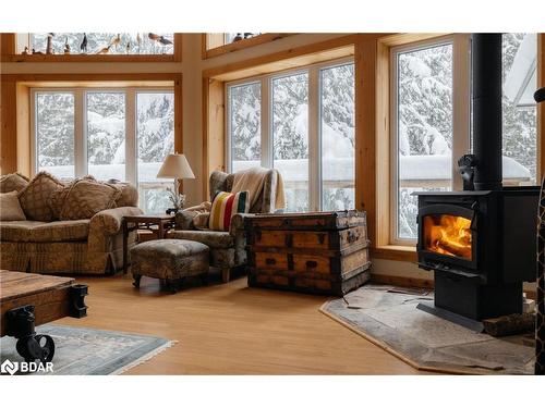 1208 Minnow Drive, Haliburton, ON - Indoor Photo Showing Living Room With Fireplace