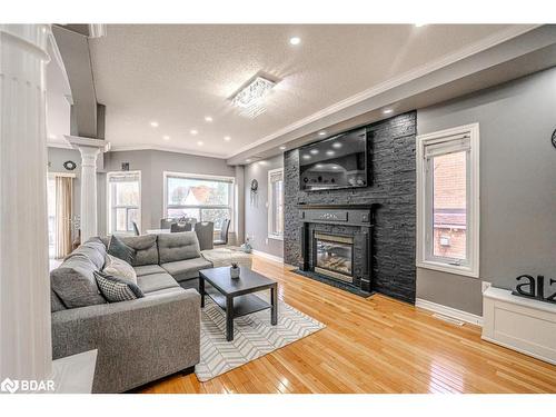 61 Carley Crescent, Barrie, ON - Indoor Photo Showing Living Room With Fireplace