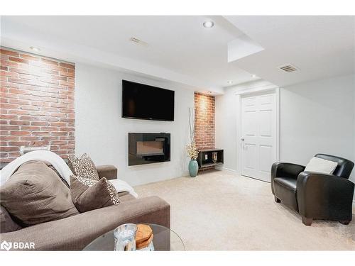 66 John W Taylor Avenue, Alliston, ON - Indoor Photo Showing Living Room With Fireplace