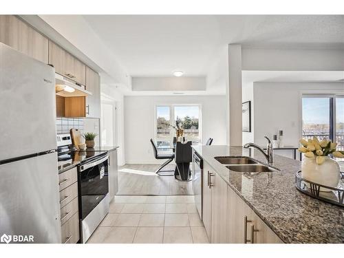 402-8 Culinary Lane, Barrie, ON - Indoor Photo Showing Kitchen With Double Sink With Upgraded Kitchen