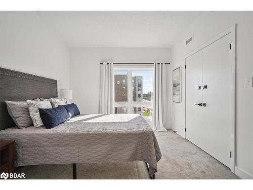 402-8 Culinary Lane, Barrie, ON - Indoor Photo Showing Bedroom