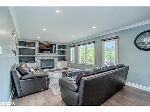 26 Riverside Drive, Mono, ON - Indoor Photo Showing Living Room With Fireplace