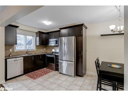 6-10 Pumpkin Pass, Binbrook, ON - Indoor Photo Showing Kitchen With Stainless Steel Kitchen With Double Sink