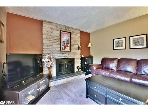 23 Debra Crescent, Barrie, ON - Indoor Photo Showing Living Room With Fireplace