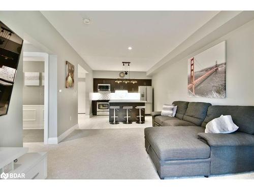 303-300 Essa Road, Barrie, ON - Indoor Photo Showing Living Room