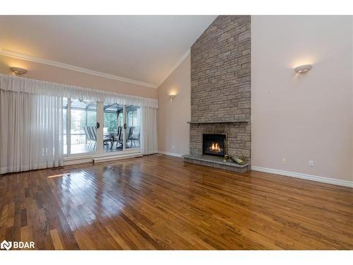 57 Lake Avenue, Ramara, ON - Indoor Photo Showing Living Room With Fireplace