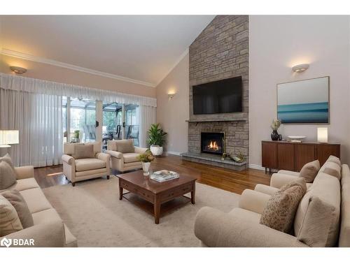 57 Lake Avenue, Ramara, ON - Indoor Photo Showing Living Room With Fireplace