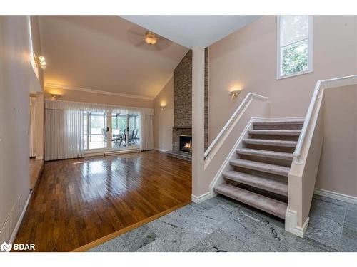 57 Lake Avenue, Ramara, ON - Indoor Photo Showing Other Room With Fireplace