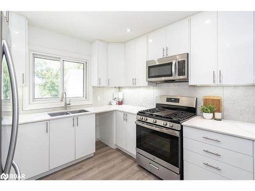 7170 Highway 9, New Tecumseth, ON - Indoor Photo Showing Kitchen With Double Sink