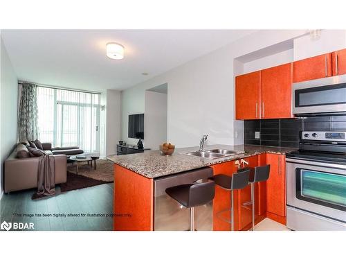 312-3515 Kariya Drive, Mississauga, ON - Indoor Photo Showing Kitchen With Double Sink