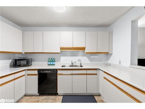 4-304 Thomas Street, Stayner, ON - Indoor Photo Showing Kitchen With Double Sink