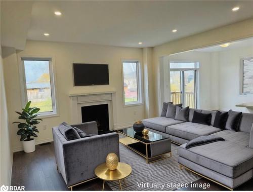 301 Quebec Street, Stayner, ON - Indoor Photo Showing Living Room With Fireplace