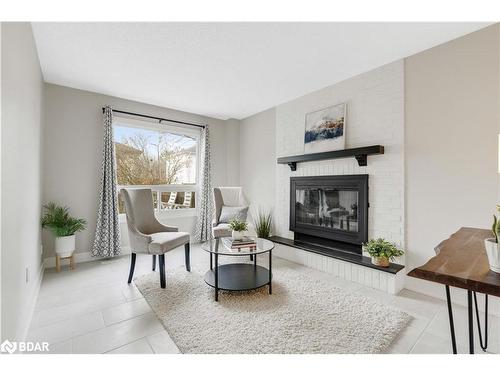 36 Carr Drive, Barrie, ON - Indoor Photo Showing Living Room With Fireplace