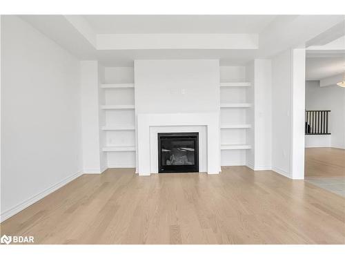 Upper-59 Suzuki Street, Barrie, ON - Indoor Photo Showing Living Room With Fireplace