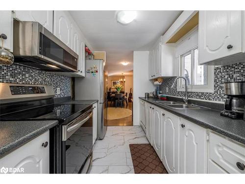 3 Green Glade Court, Innisfil, ON - Indoor Photo Showing Kitchen With Double Sink