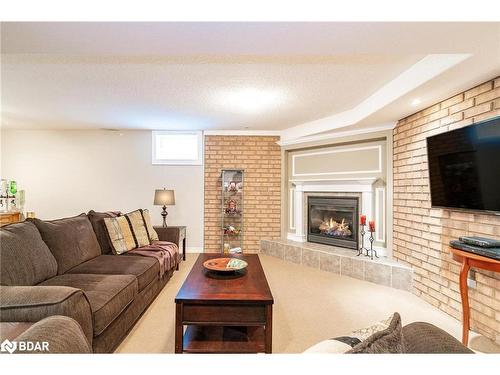 187 Sproule Drive, Barrie, ON - Indoor Photo Showing Living Room With Fireplace