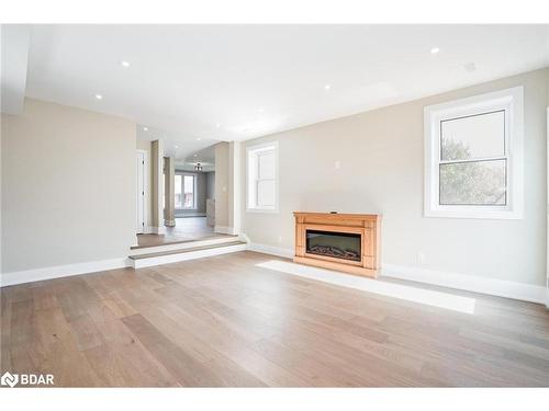 9 Bertram Drive, Elmvale, ON - Indoor Photo Showing Living Room With Fireplace