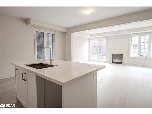 11 Amsterdam Drive, Barrie, ON - Indoor Photo Showing Kitchen With Fireplace