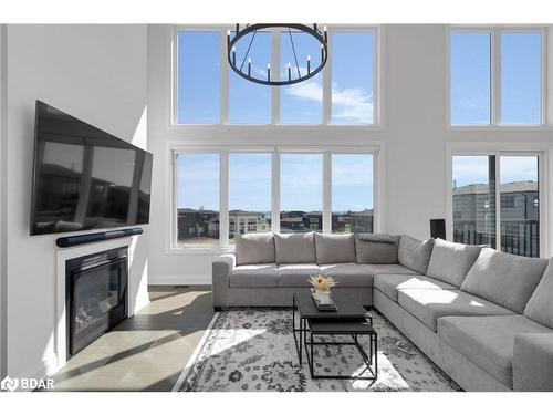 114 Sladden Court, Thornbury, ON - Indoor Photo Showing Living Room With Fireplace