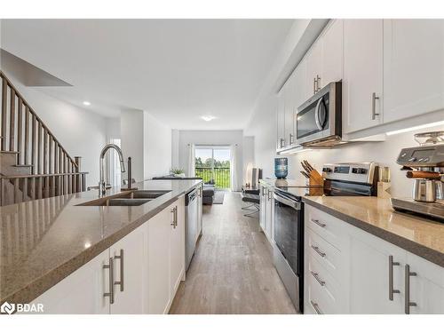 1495 Purchase Place Place, Lefroy, ON - Indoor Photo Showing Kitchen With Double Sink With Upgraded Kitchen