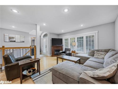 7 Howard Crescent, Barrie, ON - Indoor Photo Showing Living Room With Fireplace