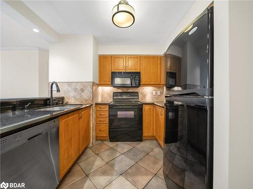 1103-140 Dunlop Street E, Barrie, ON - Indoor Photo Showing Kitchen With Double Sink