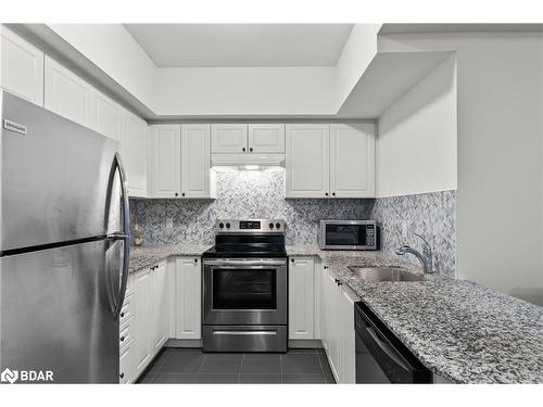 208-306 Essa Road, Barrie, ON - Indoor Photo Showing Kitchen With Stainless Steel Kitchen With Upgraded Kitchen