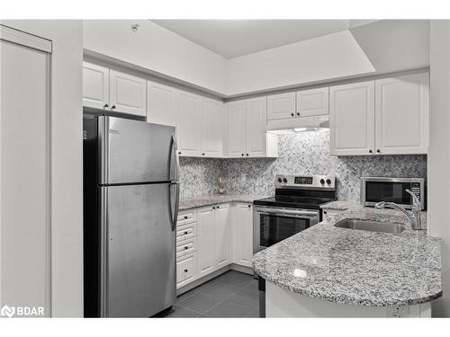 208-306 Essa Road, Barrie, ON - Indoor Photo Showing Kitchen With Stainless Steel Kitchen With Upgraded Kitchen