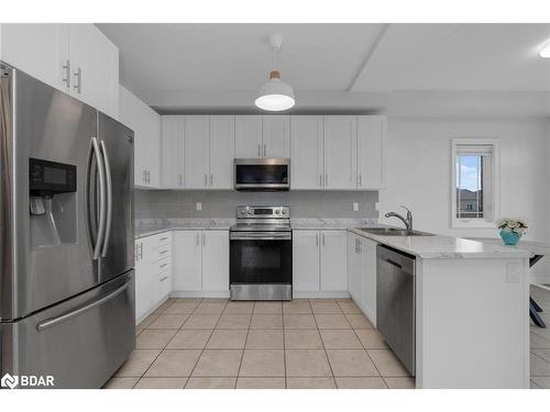 52 Pearl Street, Wasaga Beach, ON - Indoor Photo Showing Kitchen With Stainless Steel Kitchen With Double Sink