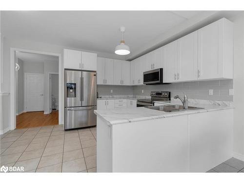 52 Pearl Street, Wasaga Beach, ON - Indoor Photo Showing Kitchen With Stainless Steel Kitchen