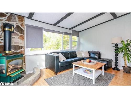 2208 Willard Avenue, Innisfil, ON - Indoor Photo Showing Living Room With Fireplace