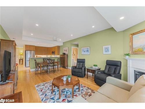 609-6 Toronto Street, Barrie, ON - Indoor Photo Showing Living Room With Fireplace