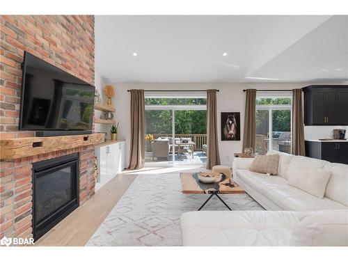 877 Pine Avenue Avenue, Innisfil, ON - Indoor Photo Showing Living Room With Fireplace