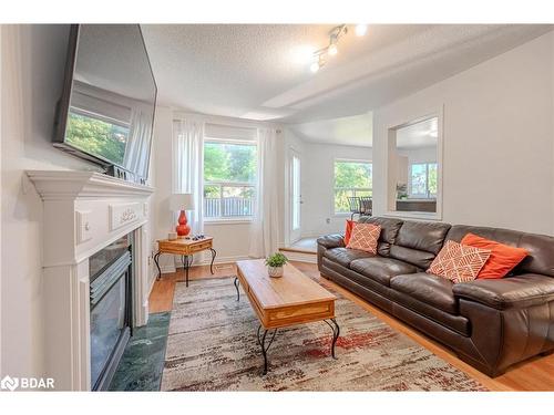 126 Madelaine Drive, Barrie, ON - Indoor Photo Showing Living Room With Fireplace