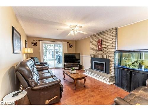 31 Little Avenue, Barrie, ON - Indoor Photo Showing Living Room With Fireplace