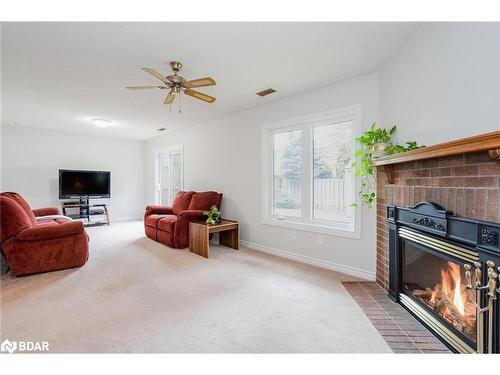 50 James Street, Barrie, ON - Indoor Photo Showing Living Room With Fireplace