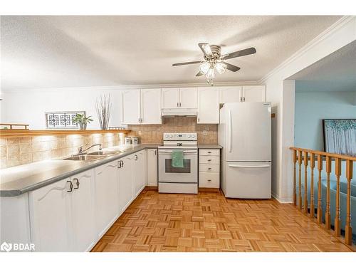 27 Waddington Crescent, Barrie, ON - Indoor Photo Showing Kitchen With Double Sink